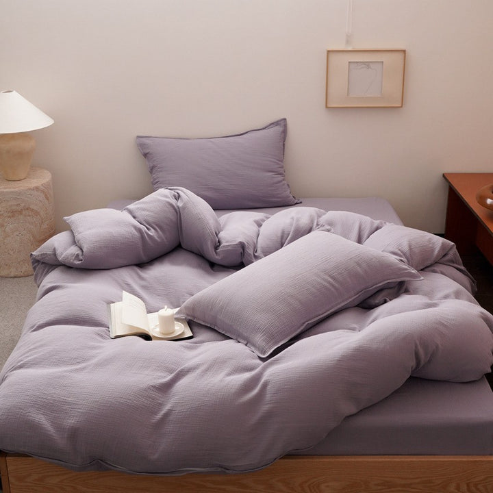 Checked cotton bedding set with soft percale texture and reversible pillowcases