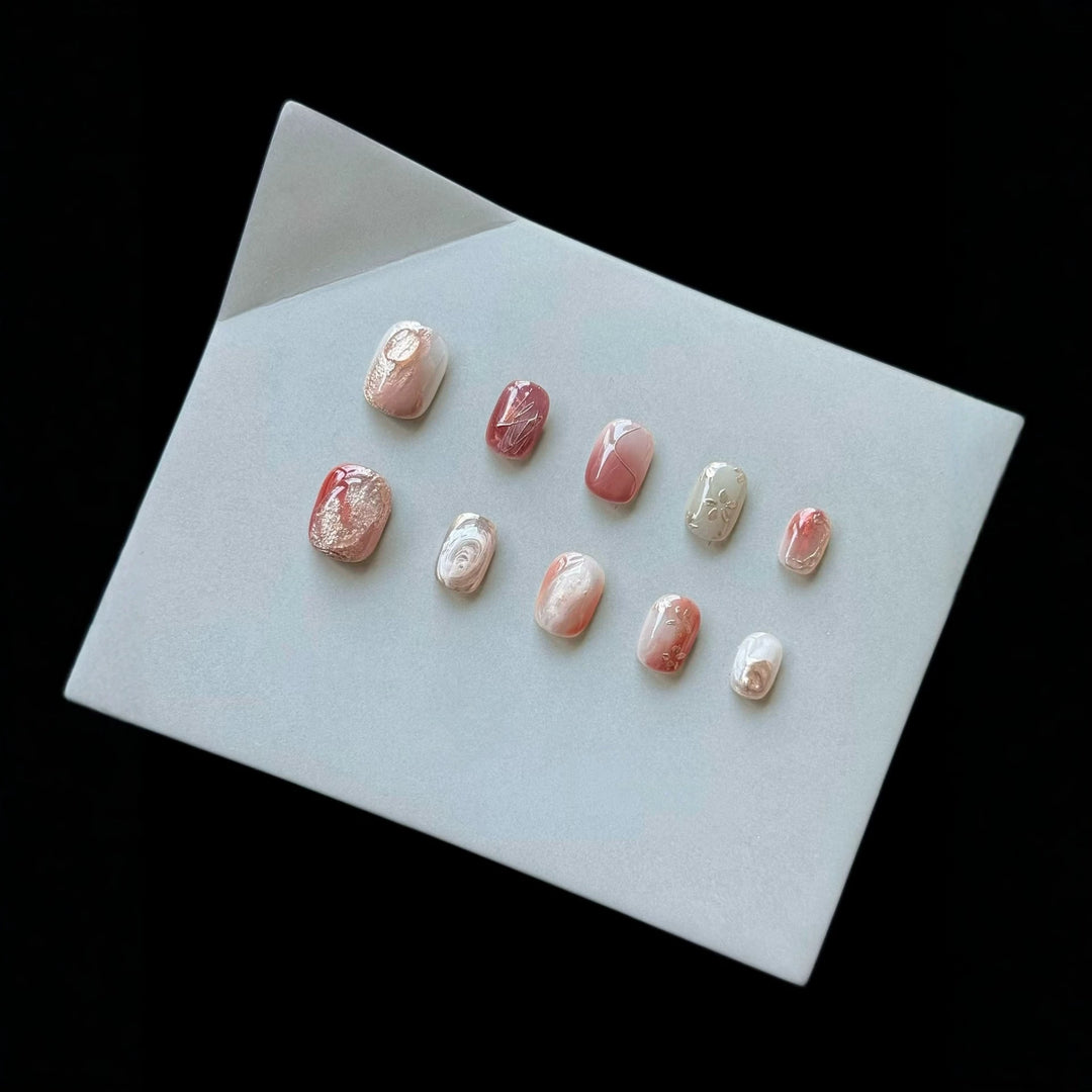 Artistic Press-On Nail Set with Marble and Metallic Accents