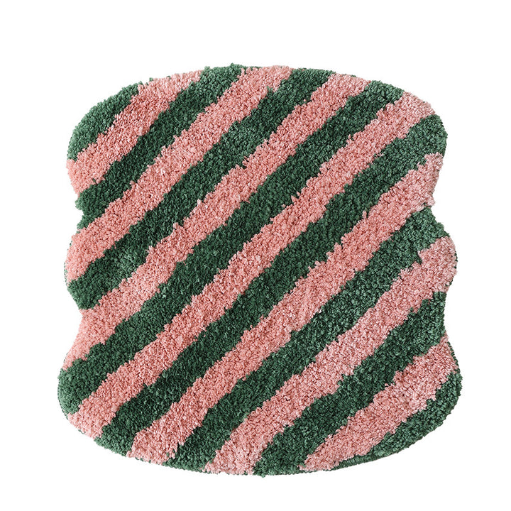 Shaped high pile bath mat with diagonal stripe structure