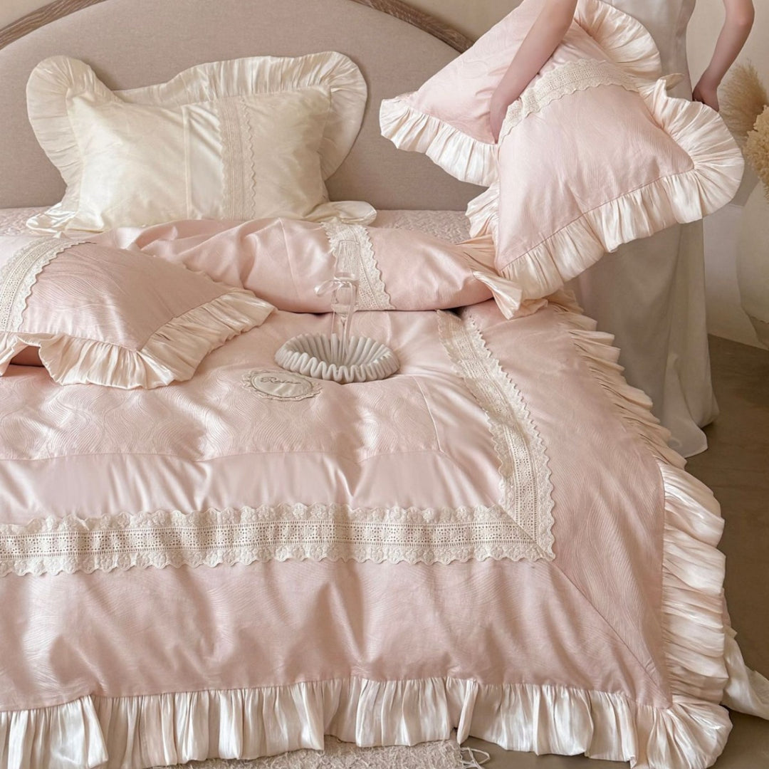 Duvet cover set with ruffle trim, fine lace border, and subtle jacquard structure