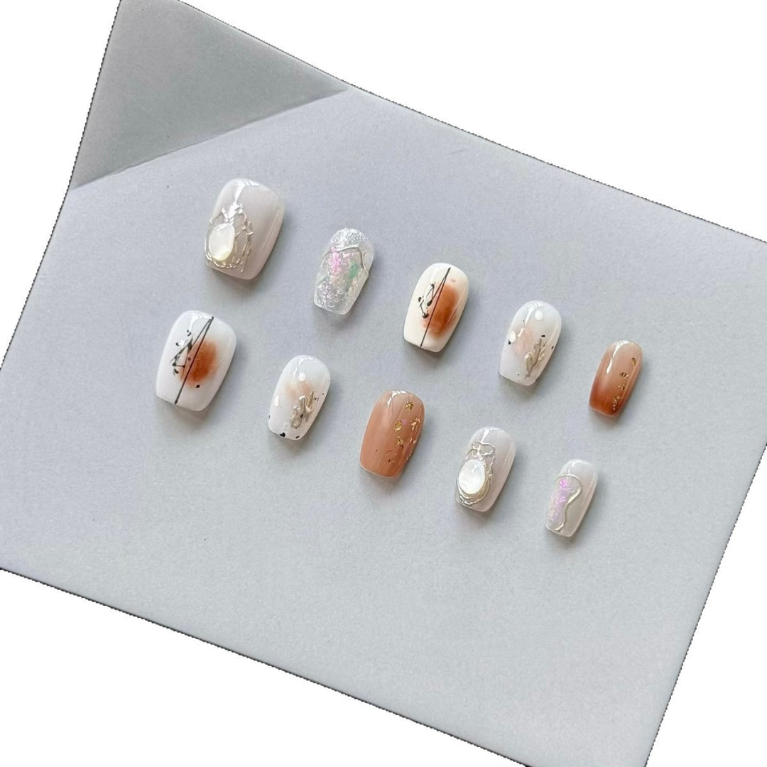 Artistic Press-On Nail Art Set with Geometric and Floral Embellishments