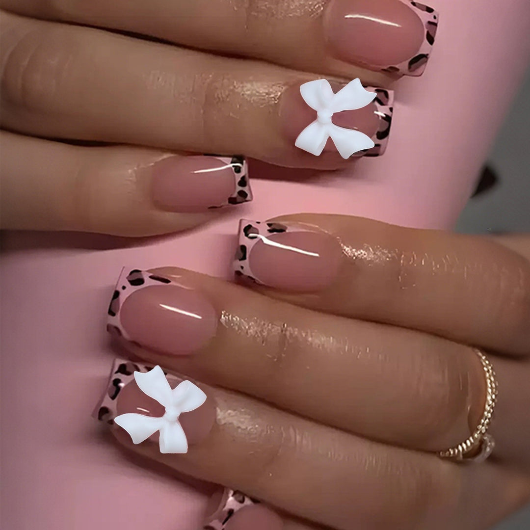 Artificial nail set with glamorous leopard pattern and elegant bows Kalsten
