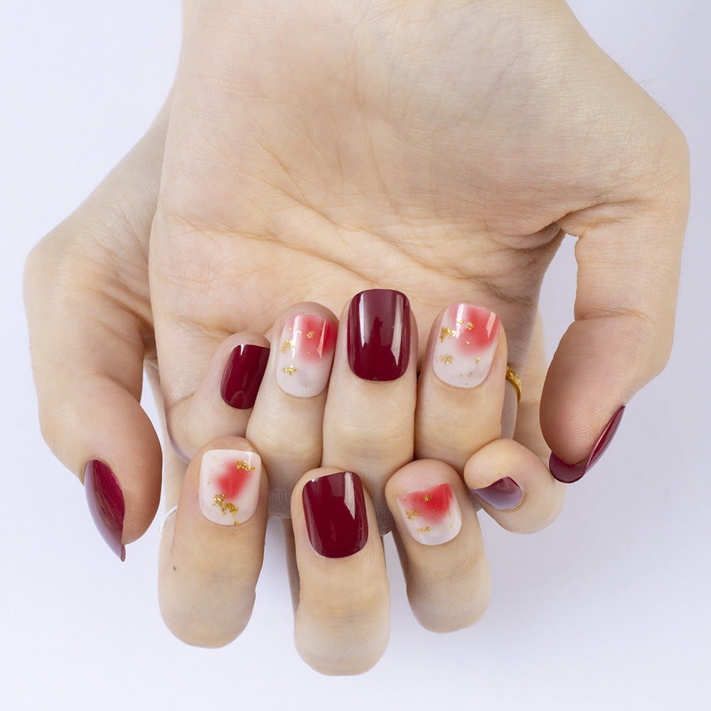 Artificial nails in modern glitter gradient design Kalsten