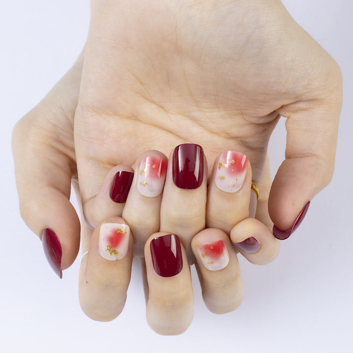 Artificial nails in modern glitter gradient design Kalsten