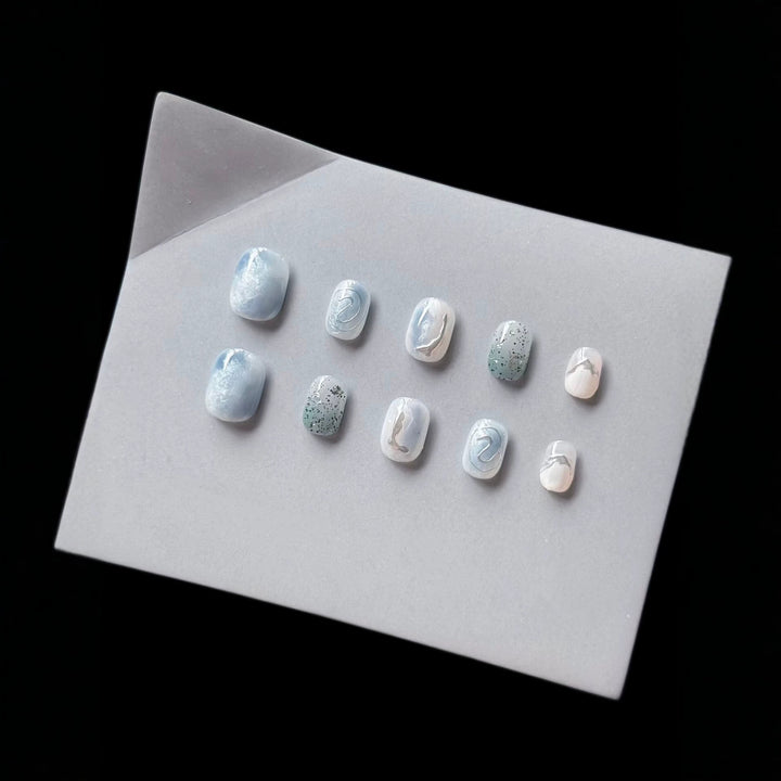 Artistic Press-On Nail Art Set with Ocean-Inspired Design