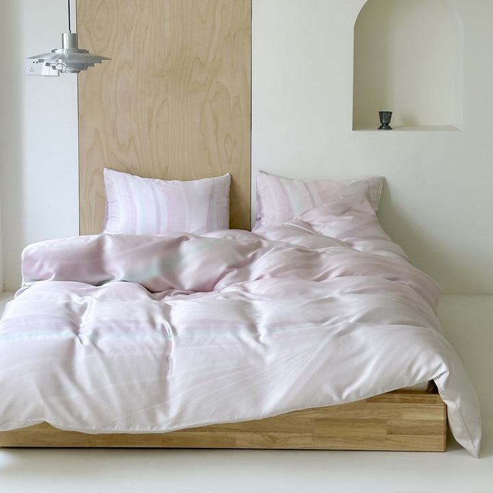 Modern striped bedding set made of cotton satin with hand-drawn stripes and contrasting piping