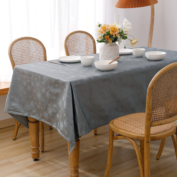 Jacquard tablecloth with intricate snowflake relief