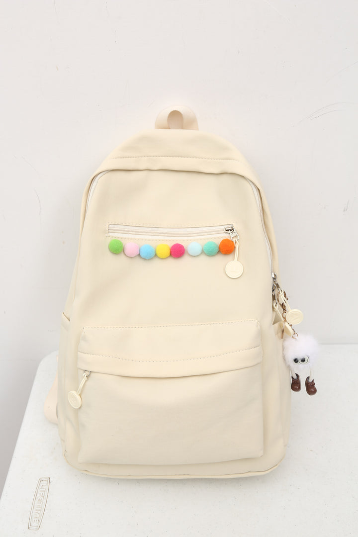 Practical backpack with colorful applications Kalsten