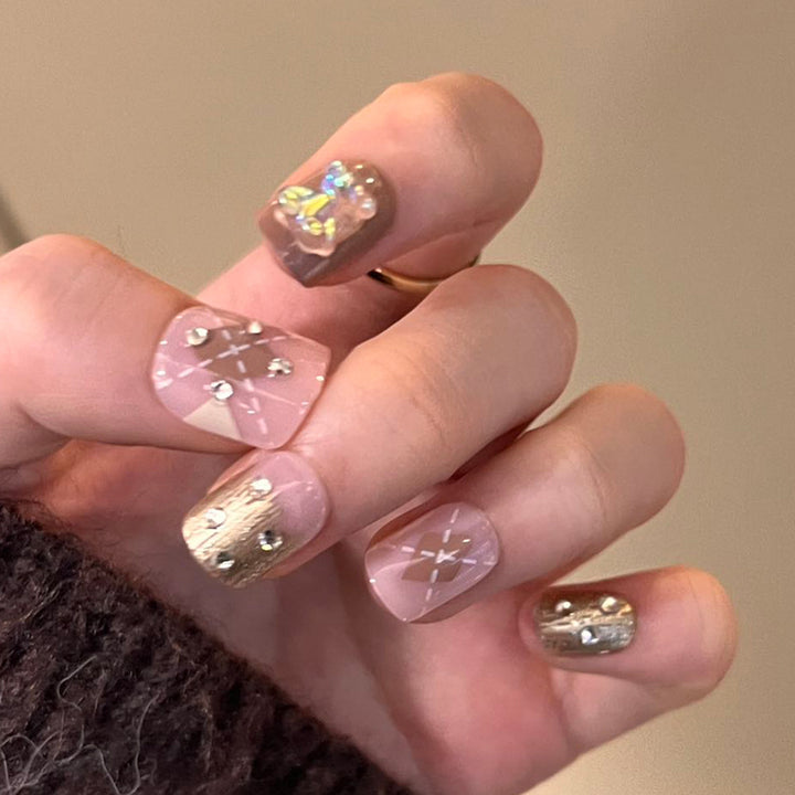 Artful nail art with elegant floral design and glitter accents Kalsten