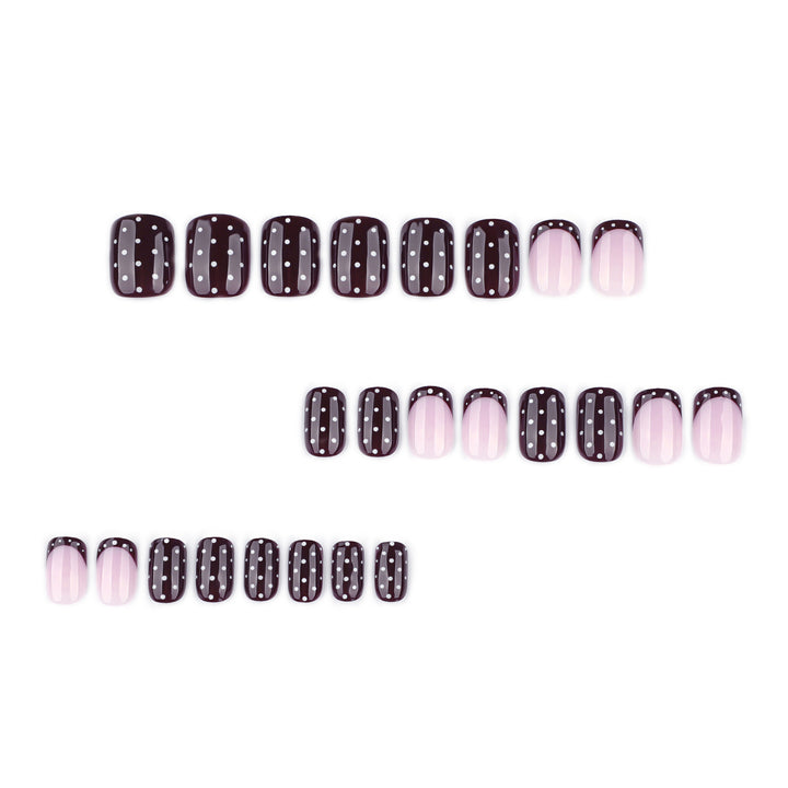 Artful nail art with elegant polka dot design Kalsten