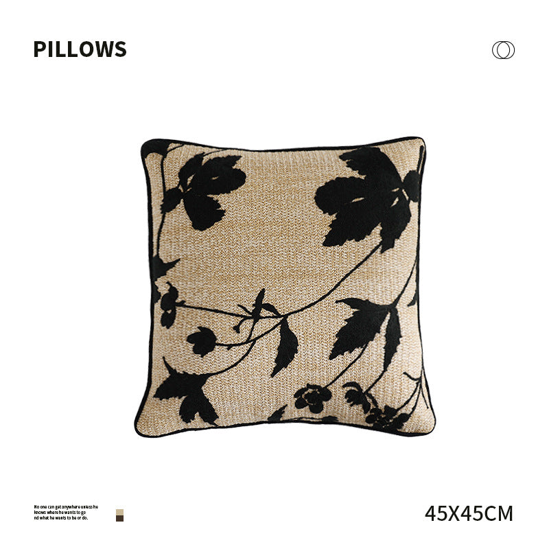 Square decorative pillow with embroidered bamboo design and natural linen texture