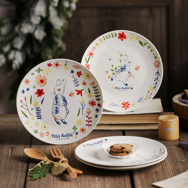 Children's plate made of porcelain with rabbit illustration and floral decoration