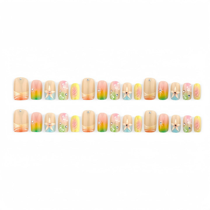 Acrylic nails with floral accents and gradient Kalsten