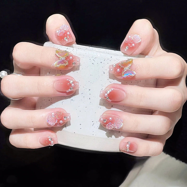 Artificial artificial nails with heart design and glitter details Kalsten