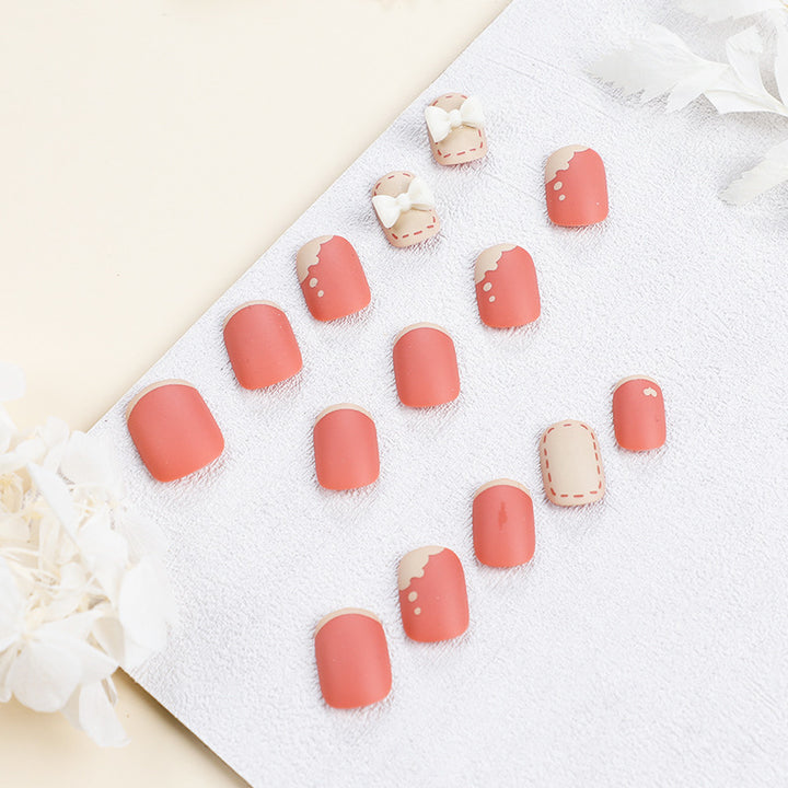 Artistic nail nails with decorative bow designs and French tips Kalsten