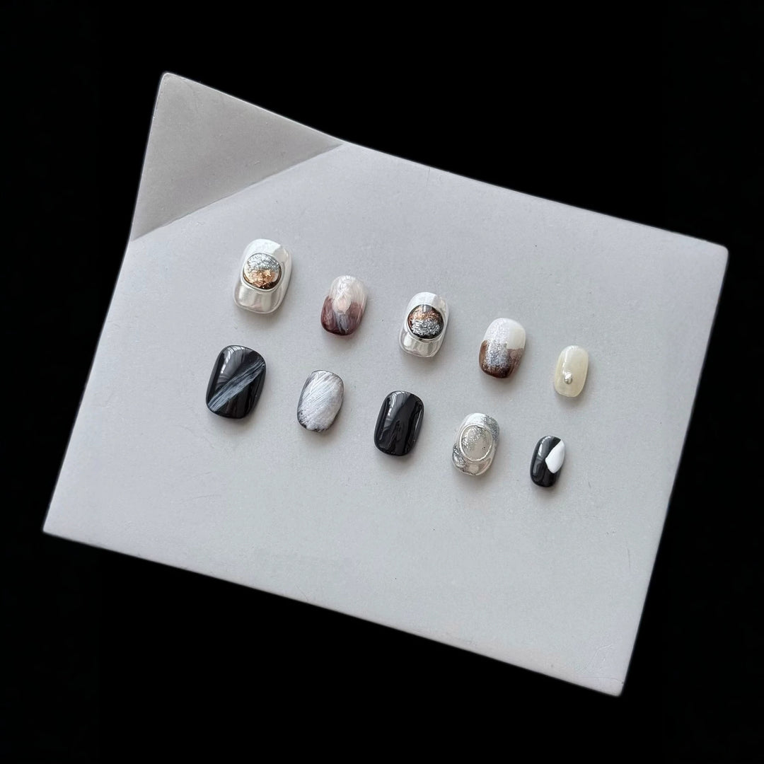 Artistic Press-On Nail Set with Elegant Designs