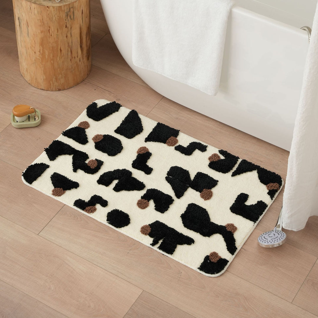 Tufted bathroom mat in abstract leopard pattern with soft high pile Kalsten