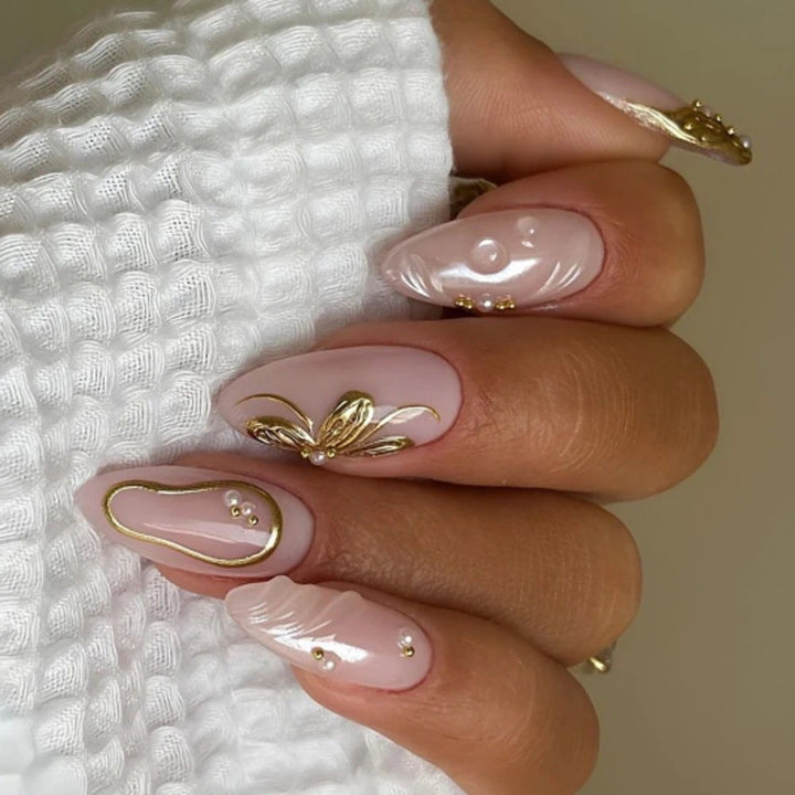 Artful acrylic nails with elegant floral accents Kalsten