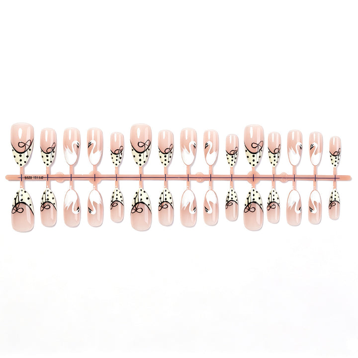 Artificial nails with elegant swans and playful bow motifs Kalsten