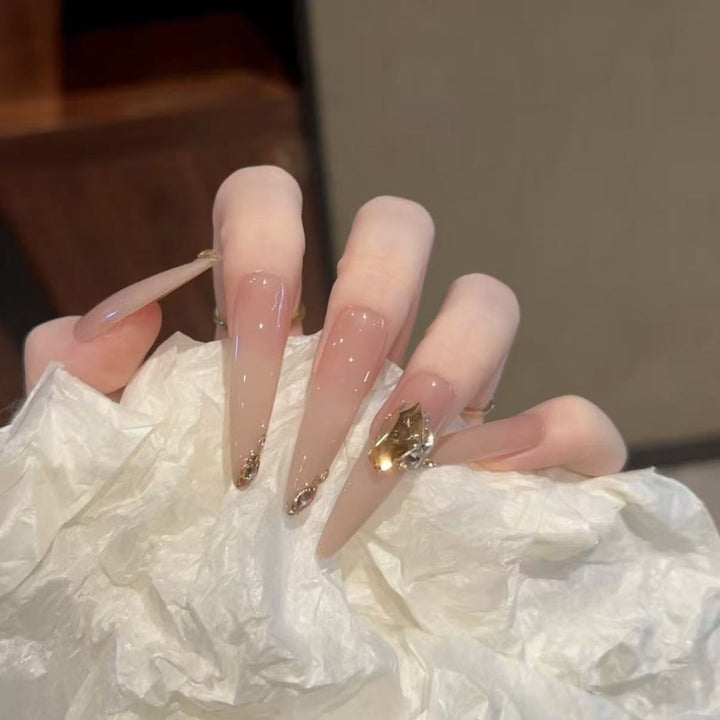 Artistic Stiletto Nail Art Extensions with Gemstone Accents