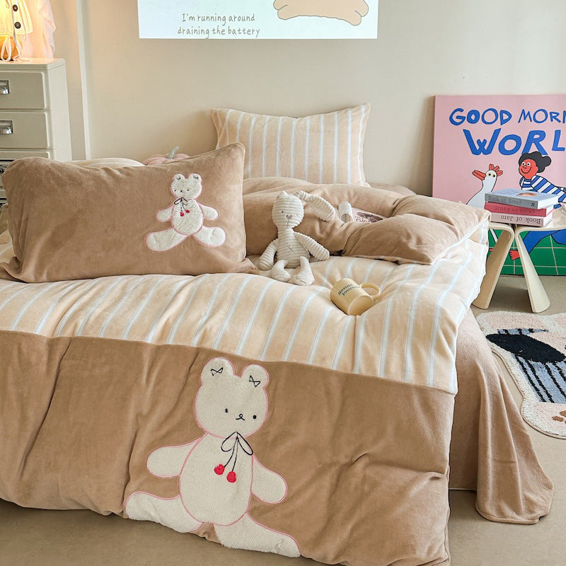 Quilted bedding and throw blanket set with check stitching, velvet texture, and floral appliqué