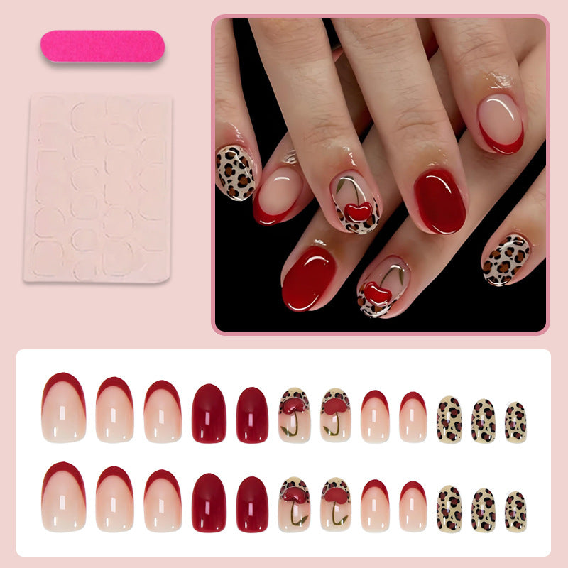 Artificial nail set with trendy leopard and cherry designs Kalsten