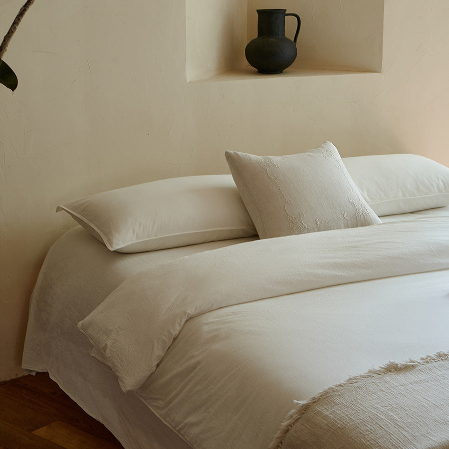 Linen bedding set with duvet cover, pillowcases and bed skirt