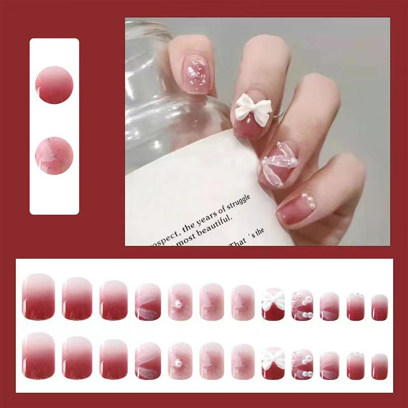 Creative art nails with bows and pearl coating Kalsten
