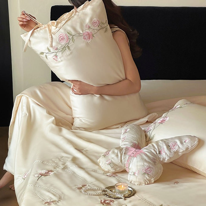Satin bedding set with embroidered rose vines and shaped butterfly decorative pillow