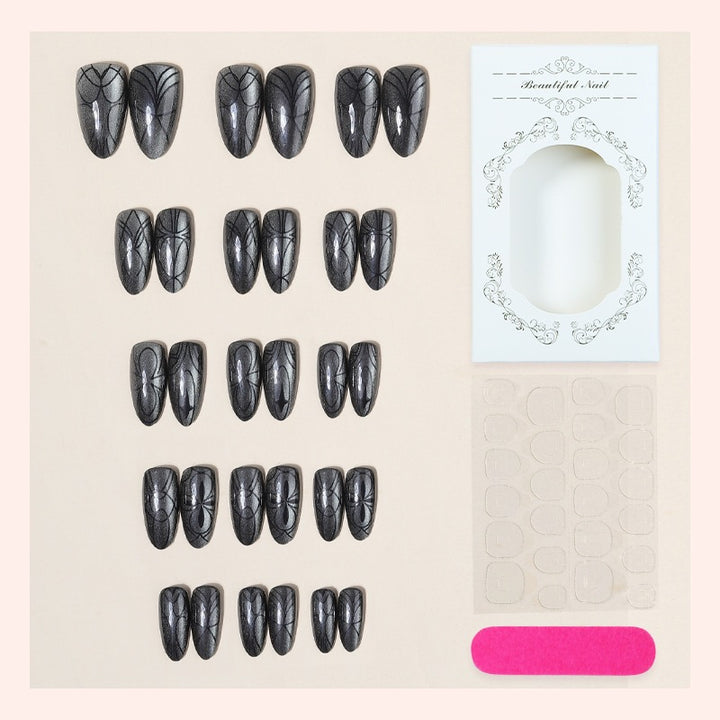 Acrylic nail set with creepy spider design and glitter accents Kalsten
