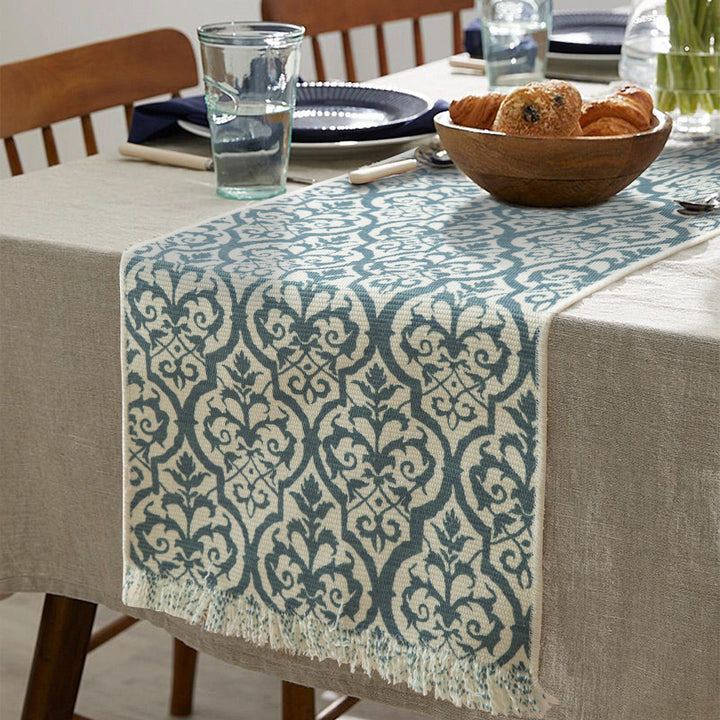 Jacquard table runner with floral vine structure and decorative fringes Kalsten