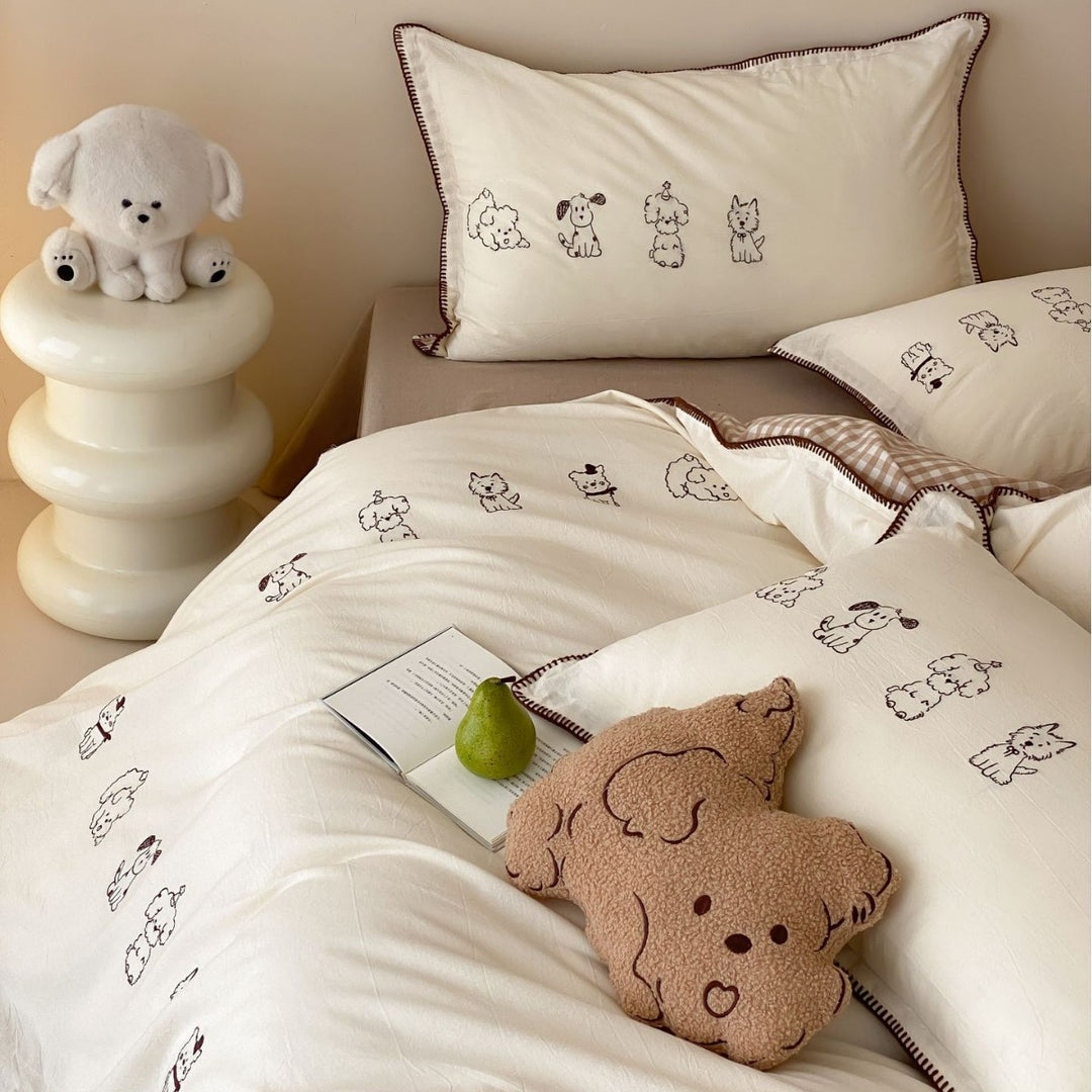 Bedding set made of cotton percale with fine embroidery and cute dog motifs