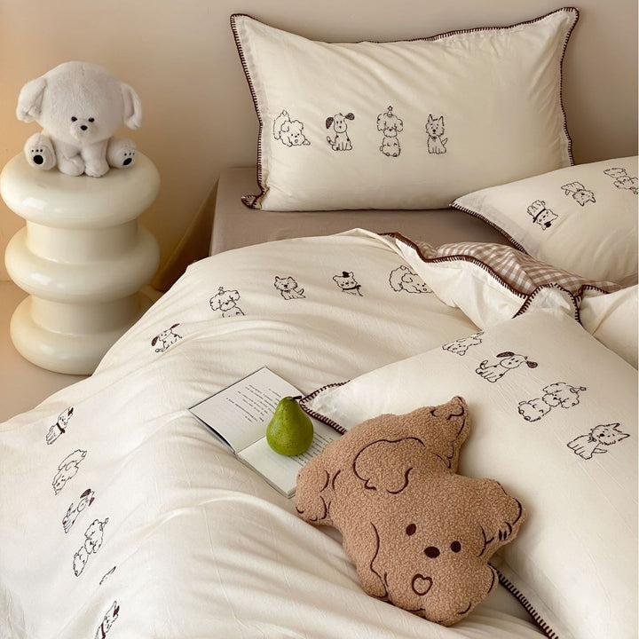 Bedding set made of cotton percale with fine embroidery and cute dog motifs