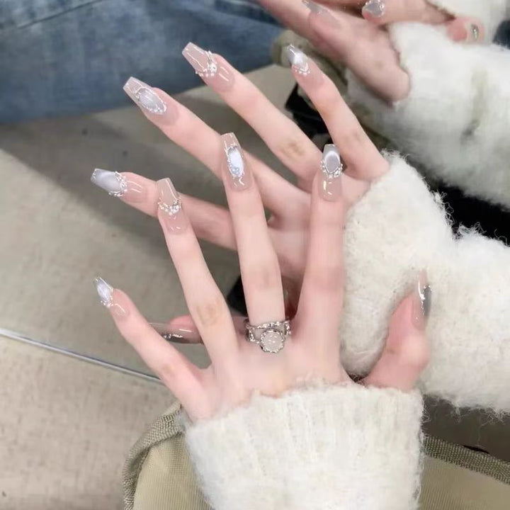 Artistic Jewel-Embellished Acrylic Nail Extensions