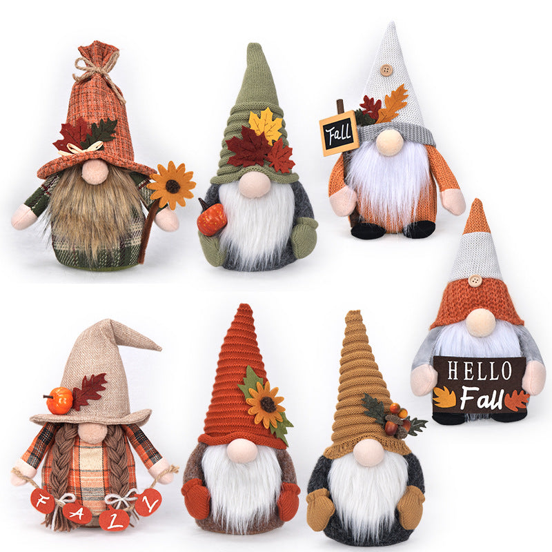 Autumn handmade decorative gnome figure with knitted hat, felt leaf application and pumpkin detail