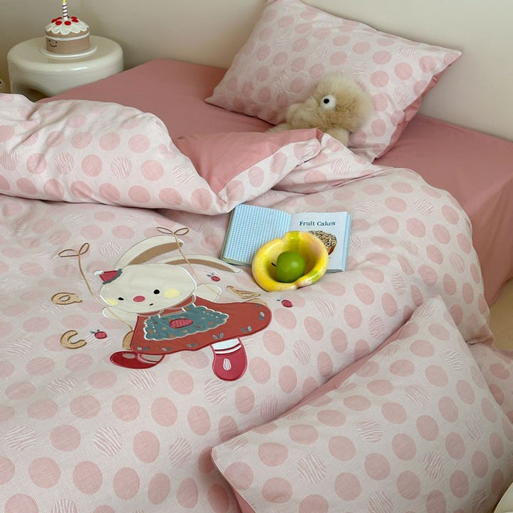 Child-friendly bedding set with embroidered rabbit motif and dotted woven texture