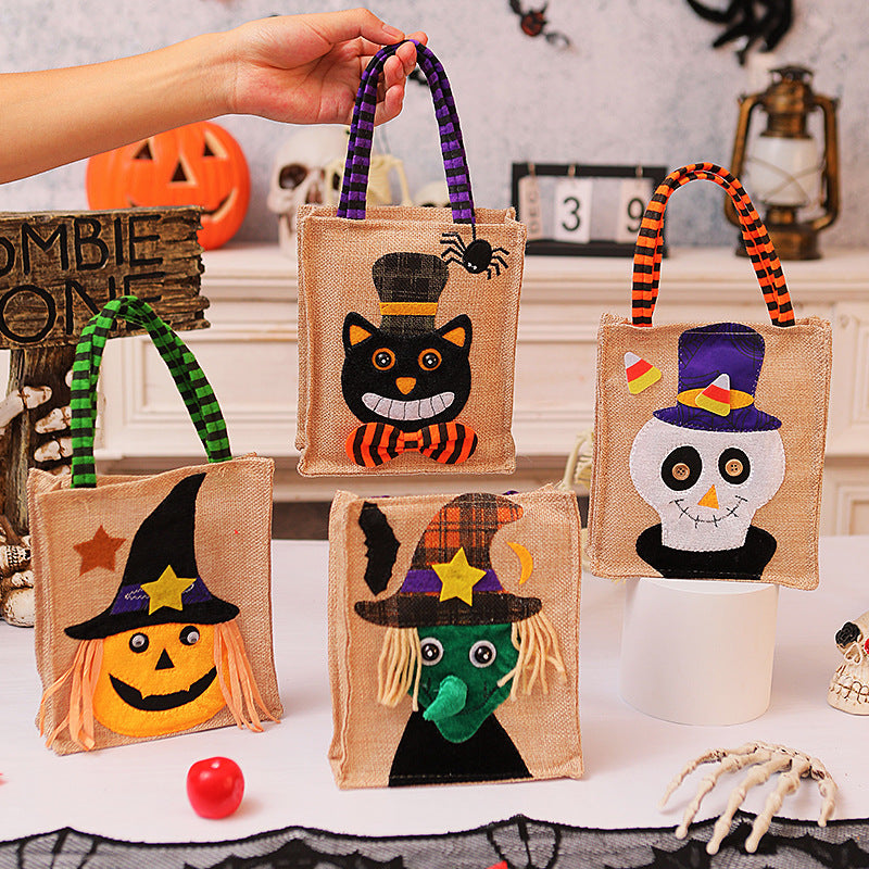 Halloween-Jute bag with stitched black cat and striped carrying handles