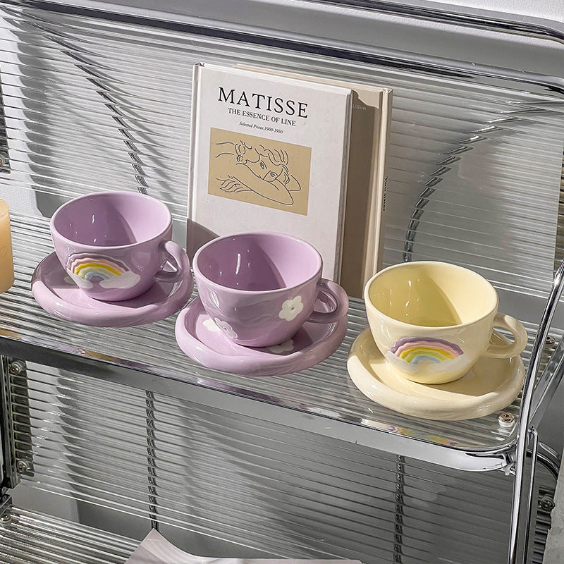 Large ceramic bowl as coffee and tea cup with matching saucer and decorative flower appliqués