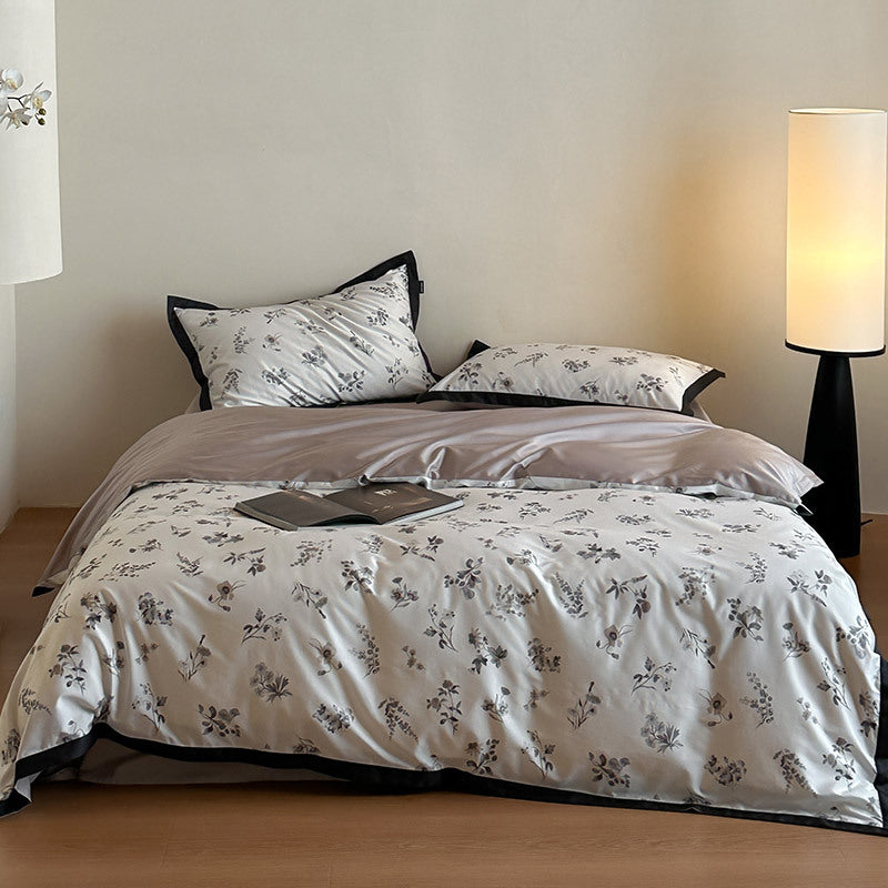Luxurious cotton satin bedding set with fine botanical print and contrasted edge