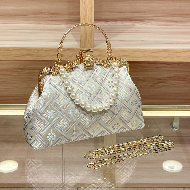 Elegant Pearl-Embellished Handbag