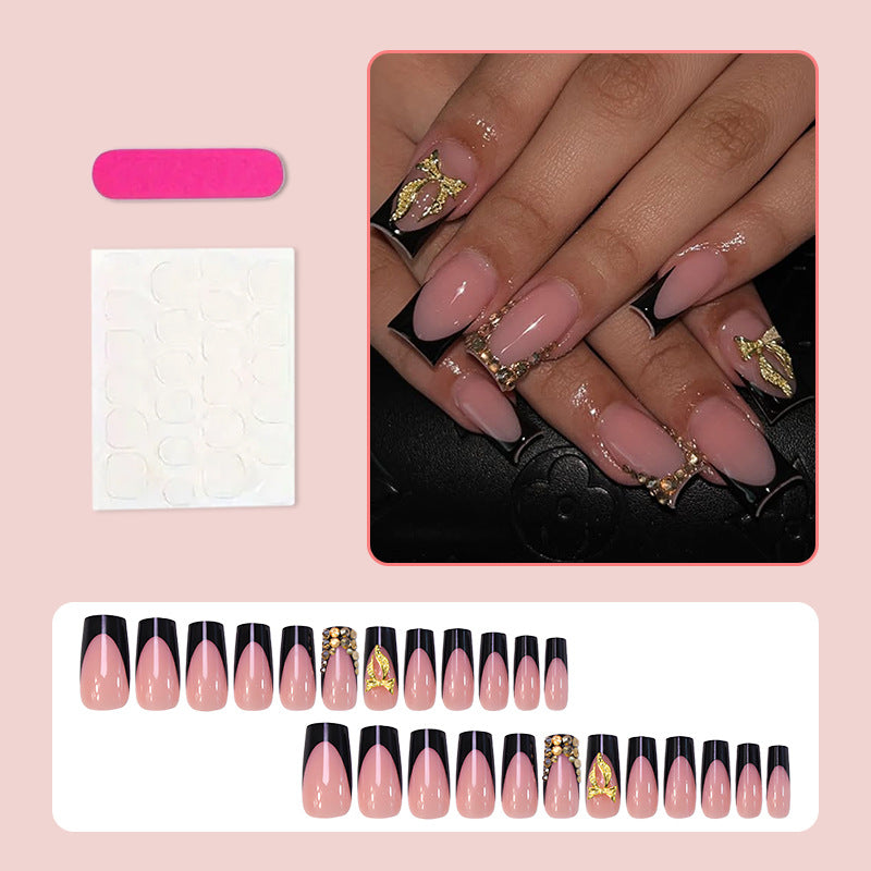 Artificial nail set with elegant gold decoration and stylish black Kalsten