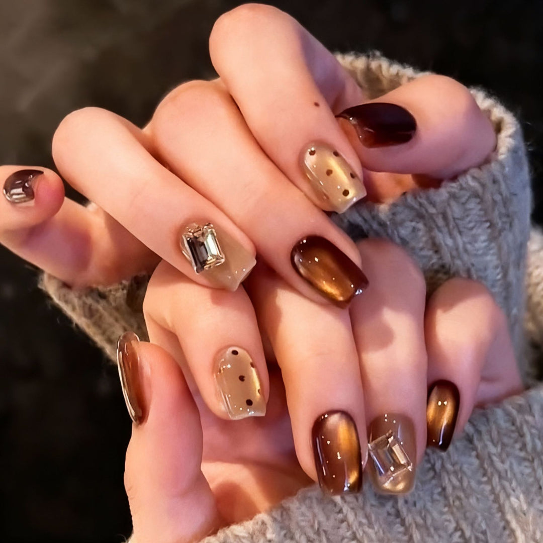Acrylic nail set with elegant ombre designs and sparkling accents Kalsten