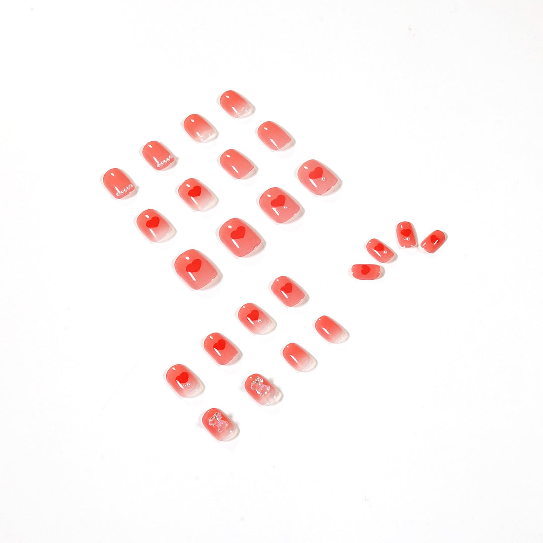 Artful nail art with radiant shine and heart motifs Kalsten