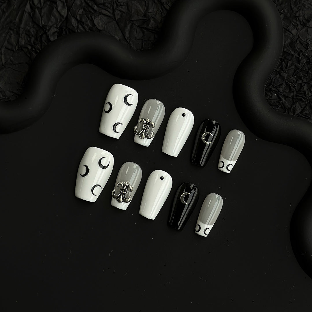 Artistic Press-On Nail Art Set with Elegant Moon and Star Designs