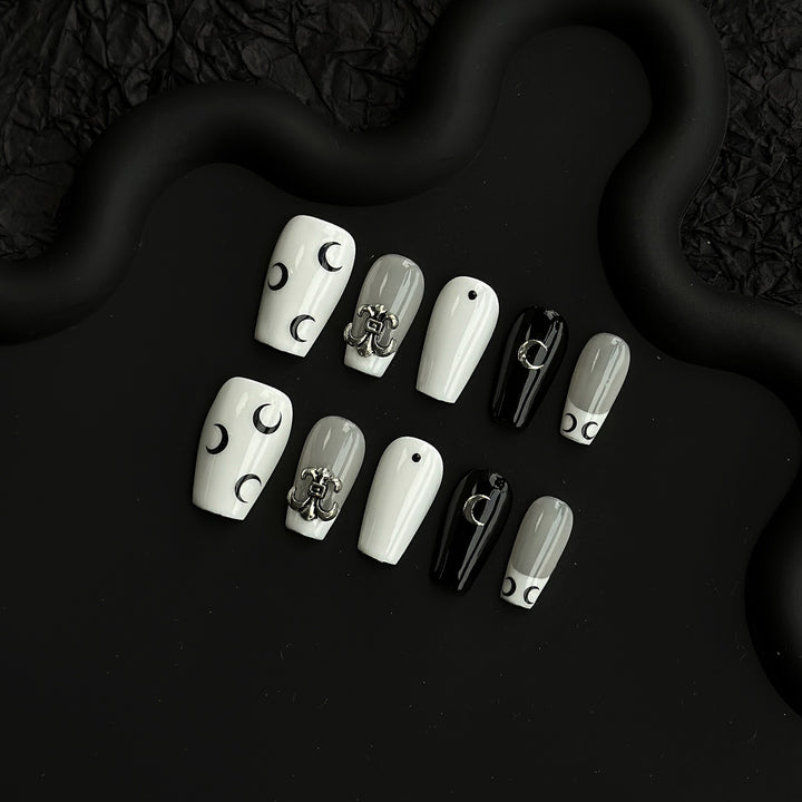 Artistic Press-On Nail Art Set with Elegant Moon and Star Designs