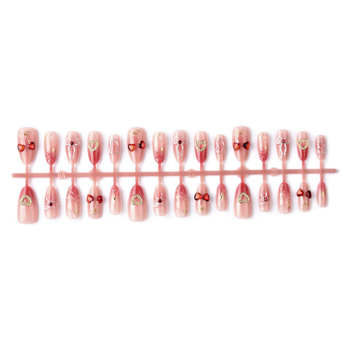 Decorative artificial nails with romantic heart and bow motifs Kalsten