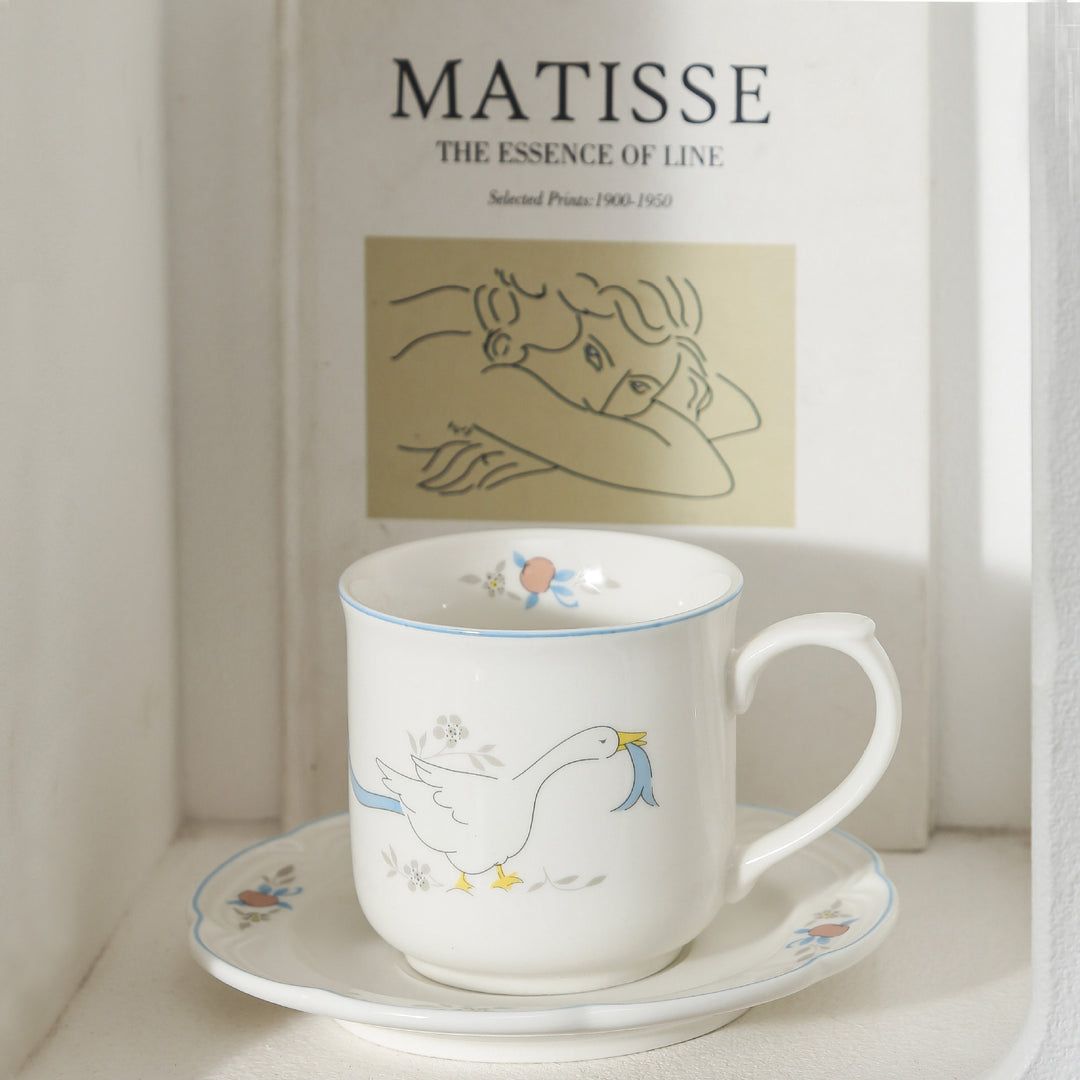 Decorative porcelain soup plate with ribbed edge and duck motif