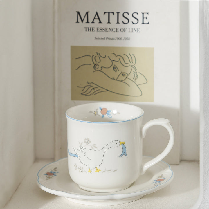 Decorative porcelain soup plate with ribbed edge and duck motif
