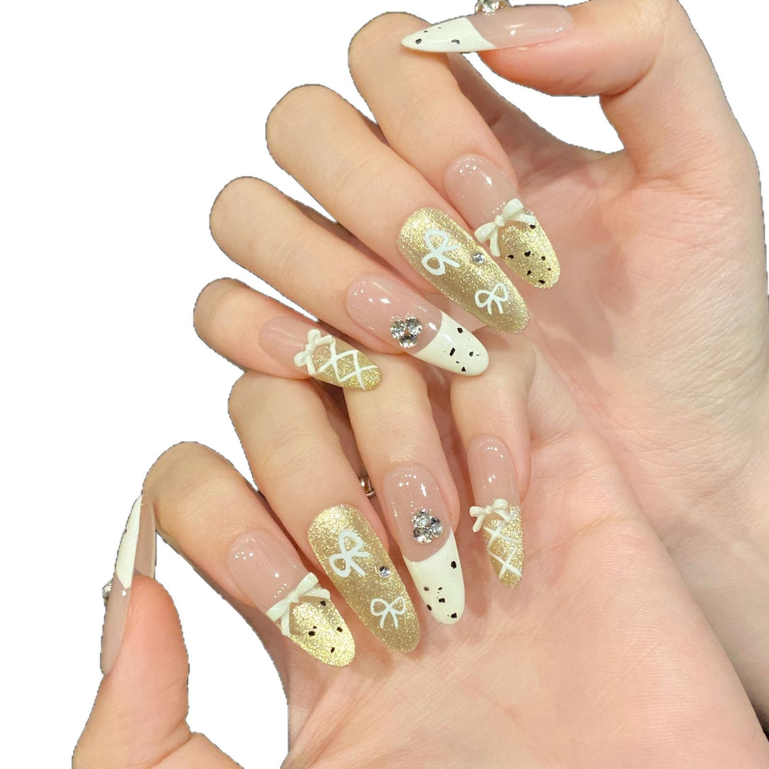 Artistic Press-On Nail Art Set with Charming Bow and Gem Accents