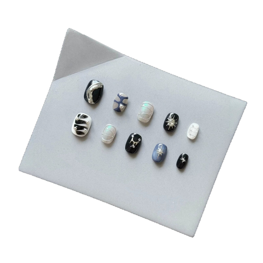 Artistic Press-On Nail Set with Cosmic Themes